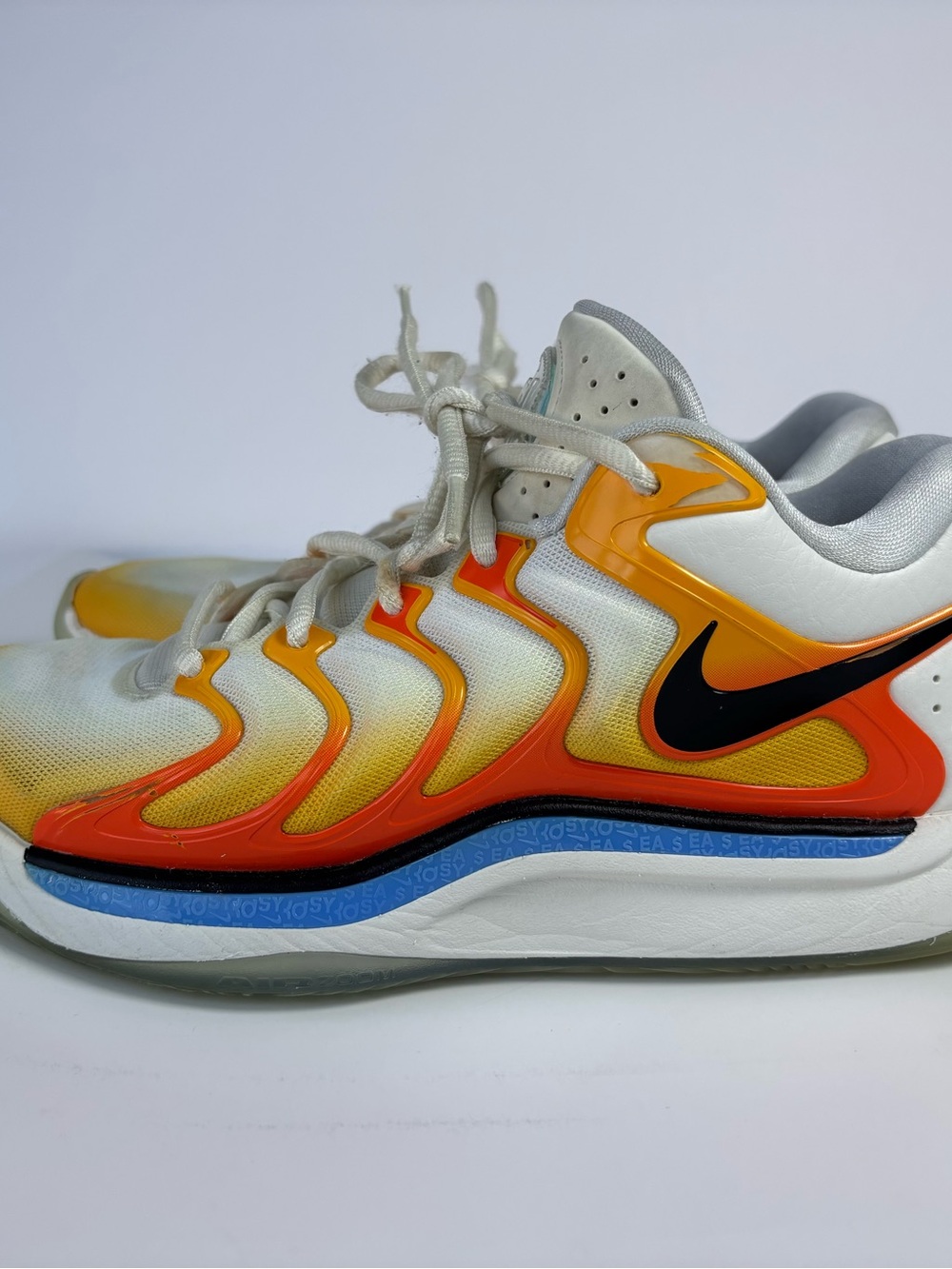 Nike Kids White Sneakers with Orange & Yellow Gradient and Black Swoosh